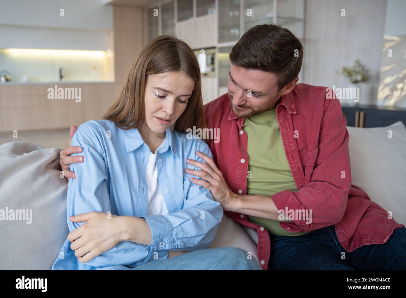 Unhappy wife feeling stress, depression, grief, being consoled by ...