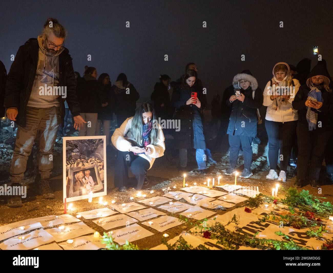 Antakya, Turkey. 06th Feb, 2024. Mourners light candles for the earthquake victims. A year ago, tens of thousands of people lost their lives in a massive earthquake in south-eastern Turkey. Credit: Boris Roessler/dpa/Alamy Live News Stock Photo