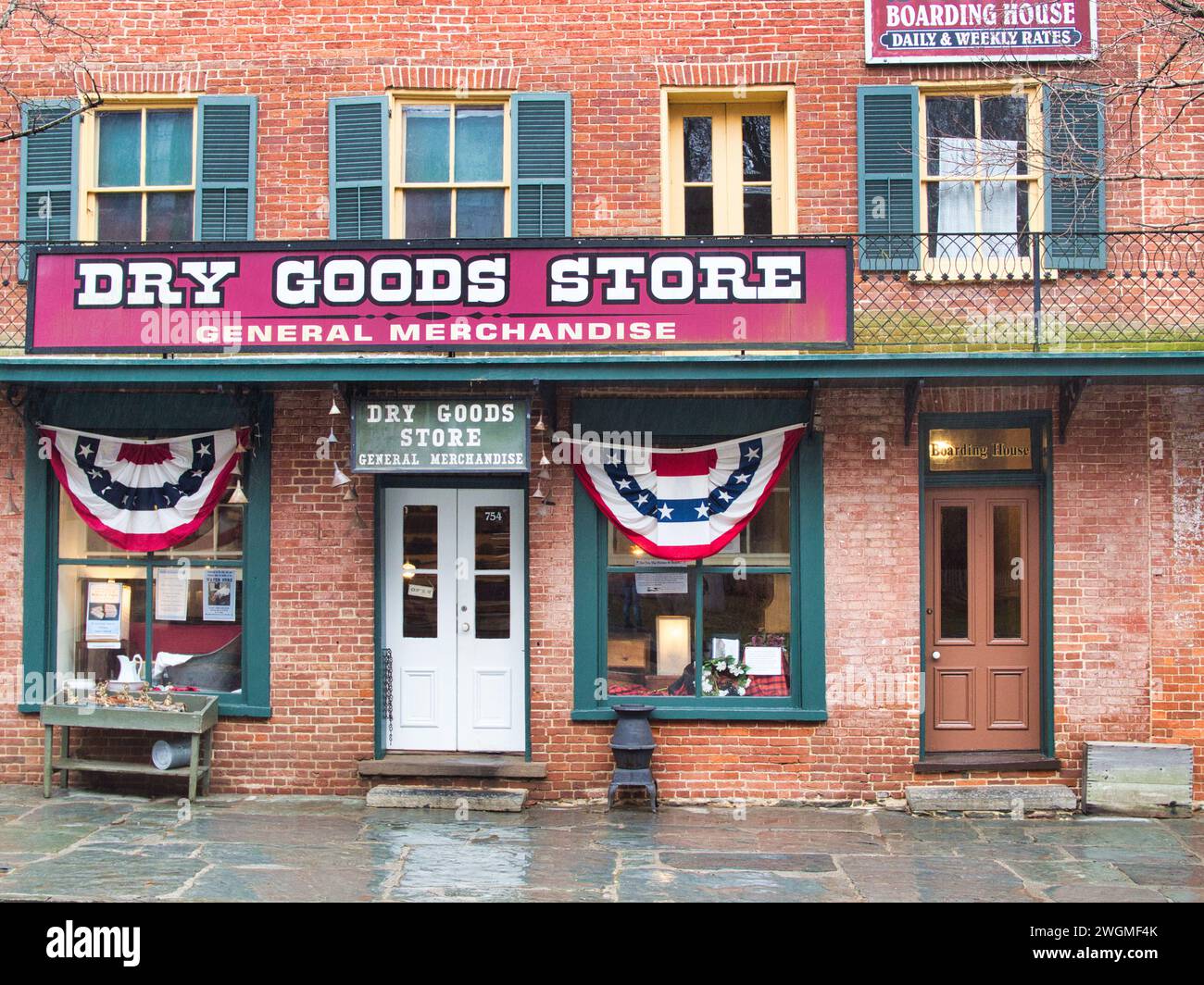 Store front of brick Dry Goods Store in historic downtown Harpers Ferry, WV, on a winter day. Stock Photo