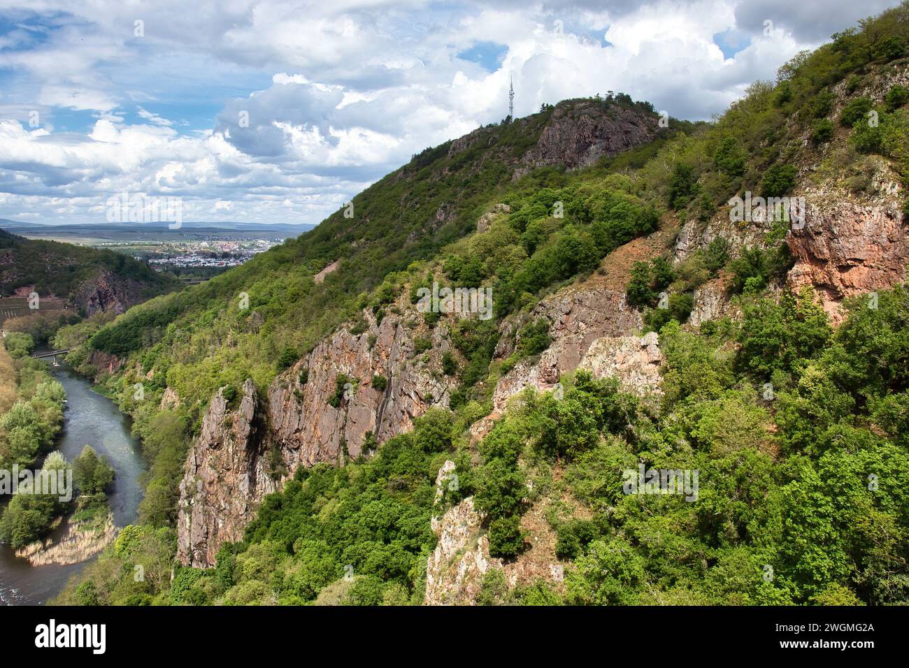 Sun shining on Rotenfels above the Nahe River on a spring day in Rhineland Palatinate, Germany. Stock Photo