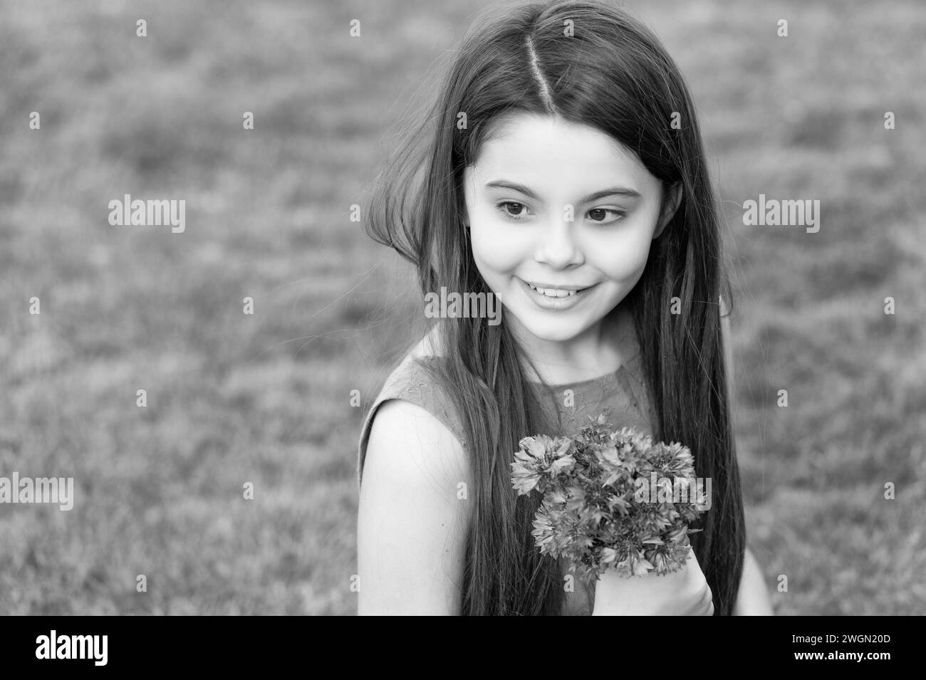 face of teen girl with flowers. pretty girl with spring bouquet. cute