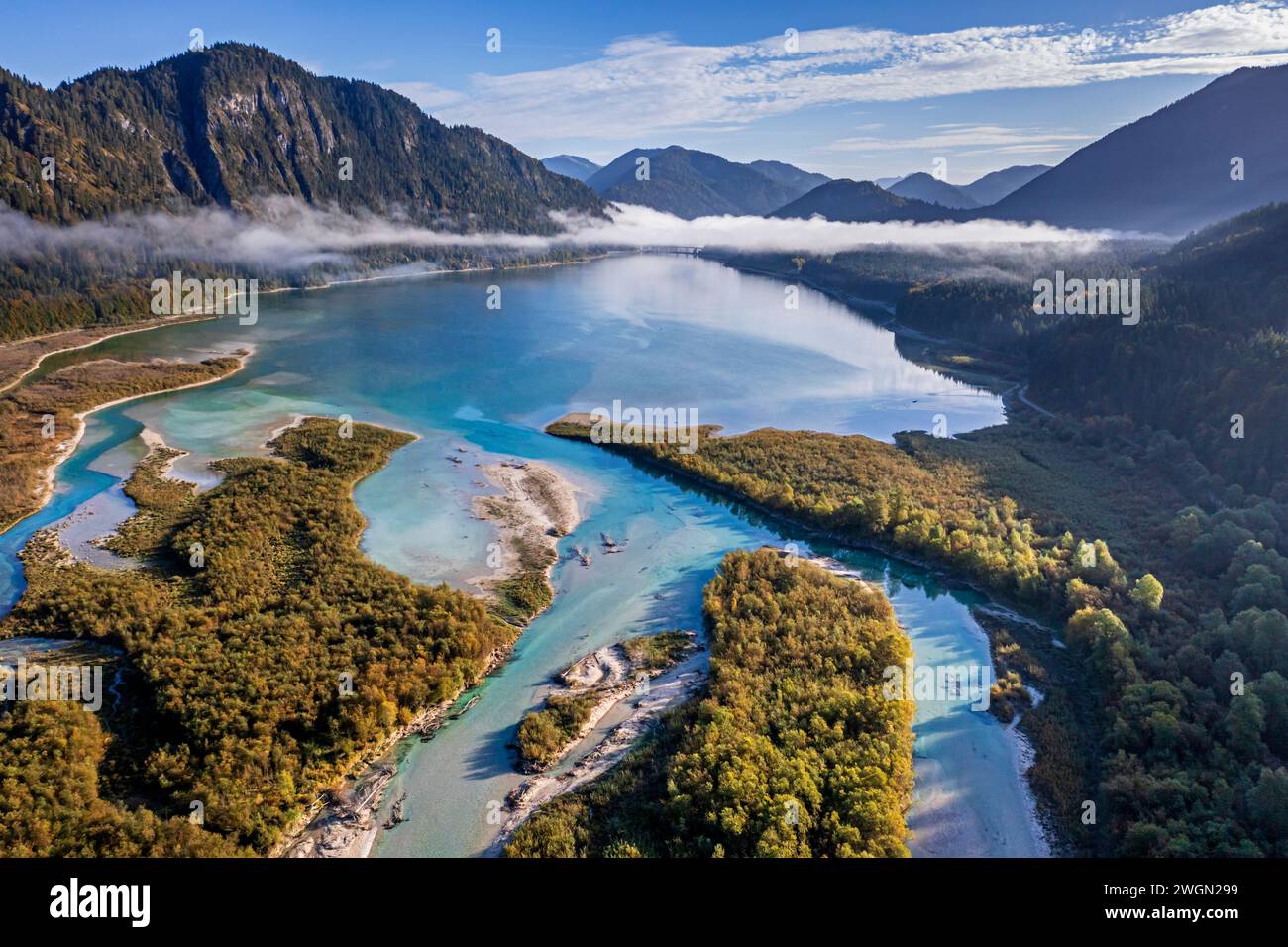 Aerial view of riverbed and lake with mountains, sunny, Sylvenstein ...