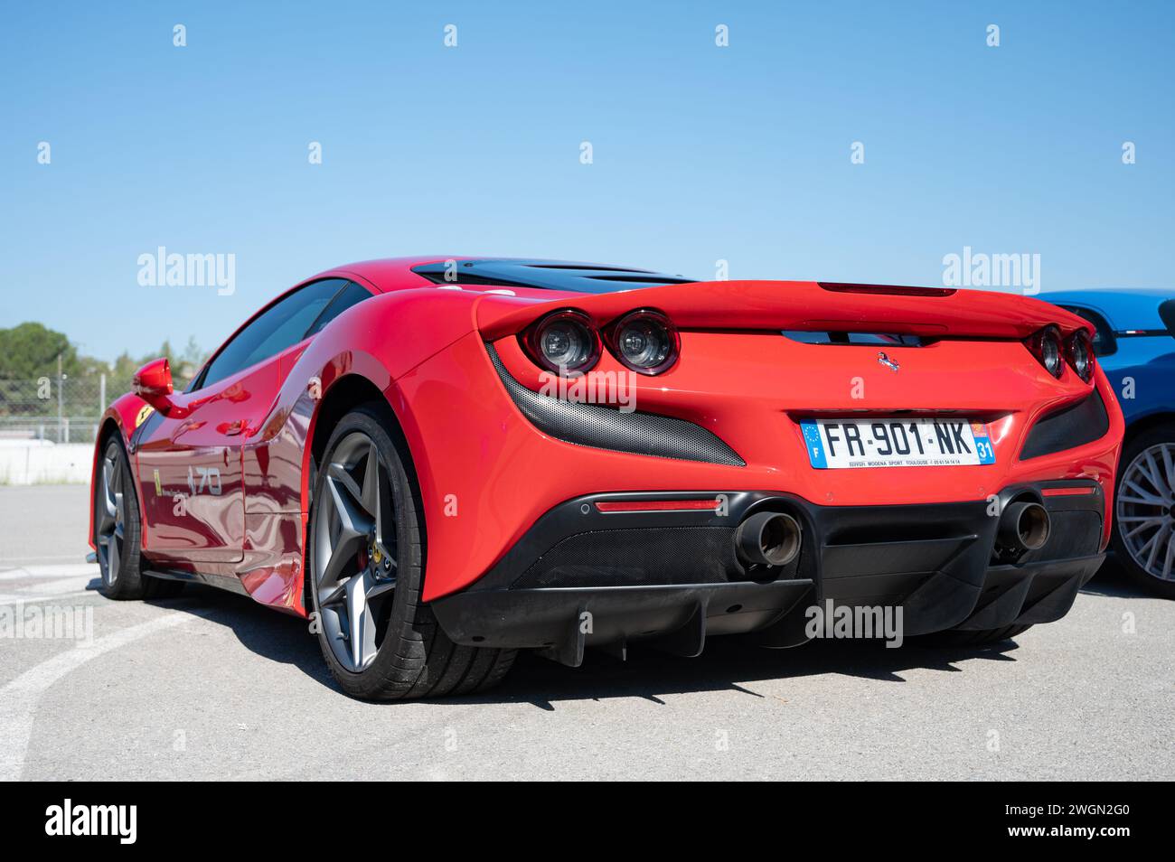 Rear view of the impressive red Italian Ferrari F8 Tributo sports car Stock Photo