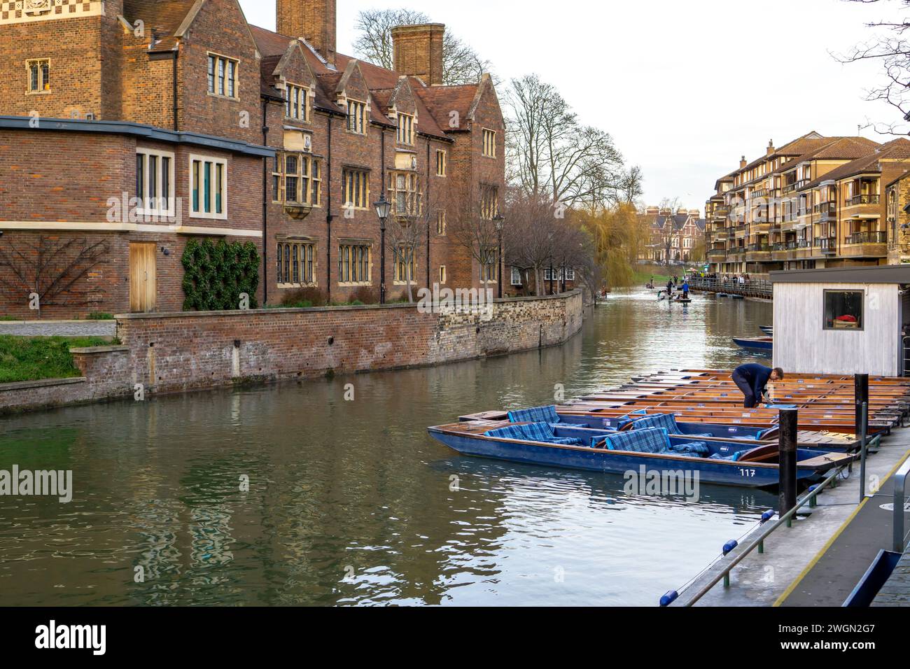 Punting boats tied up on the River Cam in Cambridge UK Stock Photo