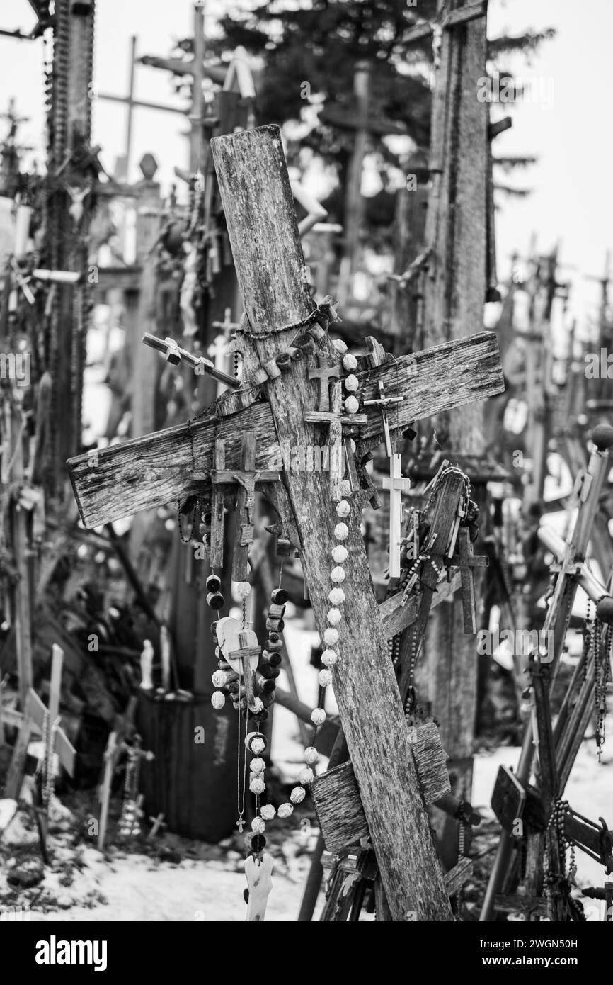 In the heart of Lithuania, the Hill of Crosses rises proudly, a symbol of the nation's enduring faith and spiritual resilience. Stock Photo