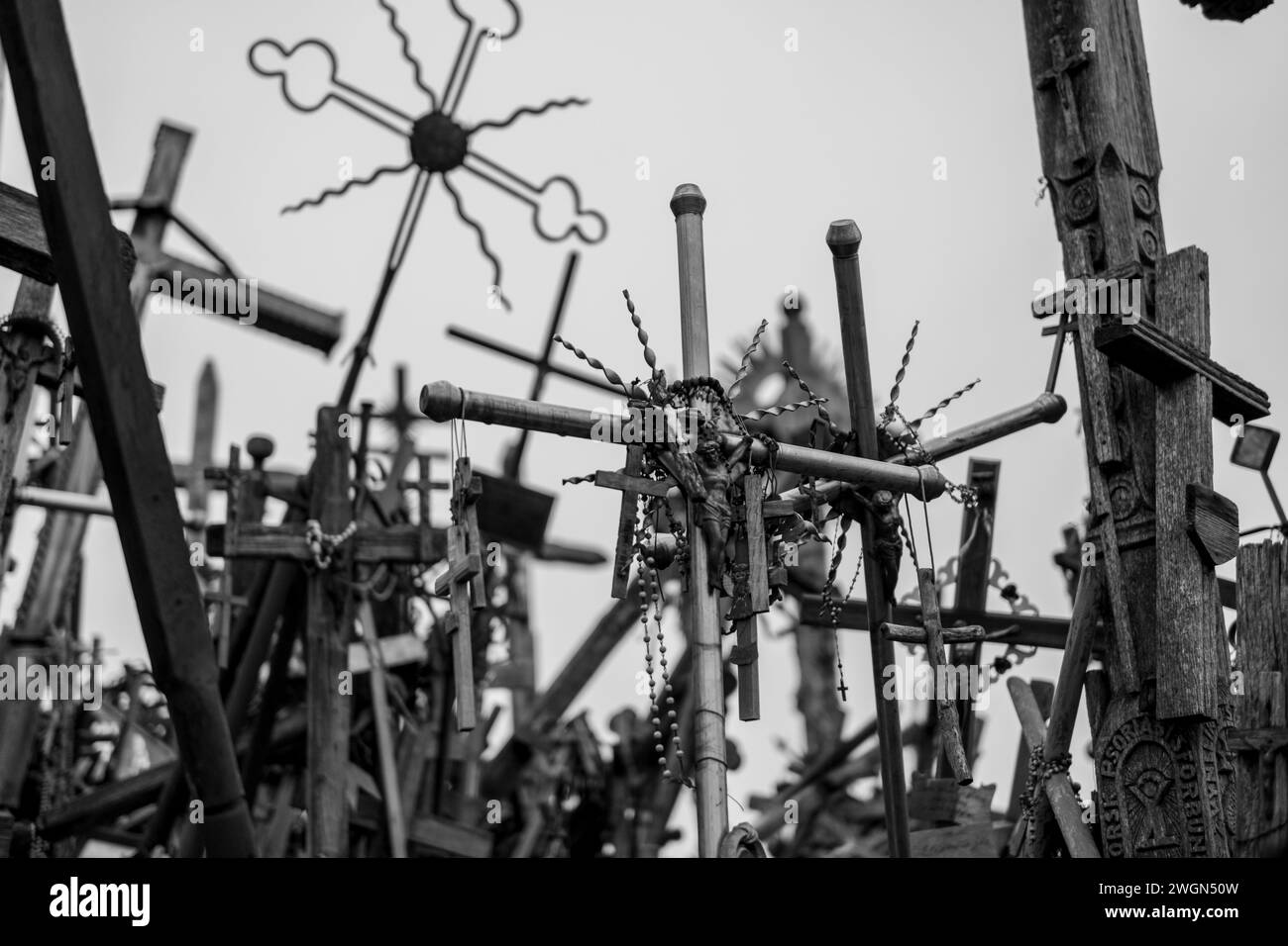 For centuries, Lithuania's Hill of Crosses has been a place of pilgrimage and prayer, drawing visitors from near and far. Stock Photo