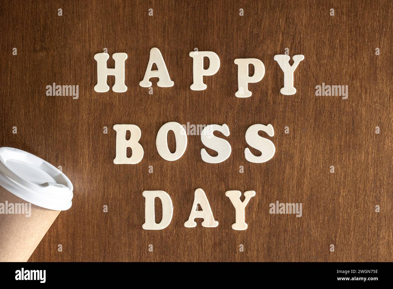 Wooden inscription Happy Boss Day on a wooden background Stock Photo ...