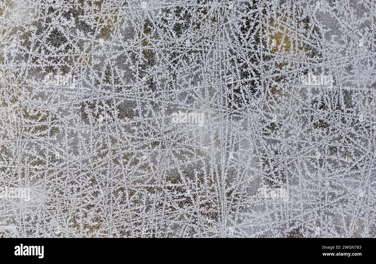 Thin frost pattern on window surface Stock Photo