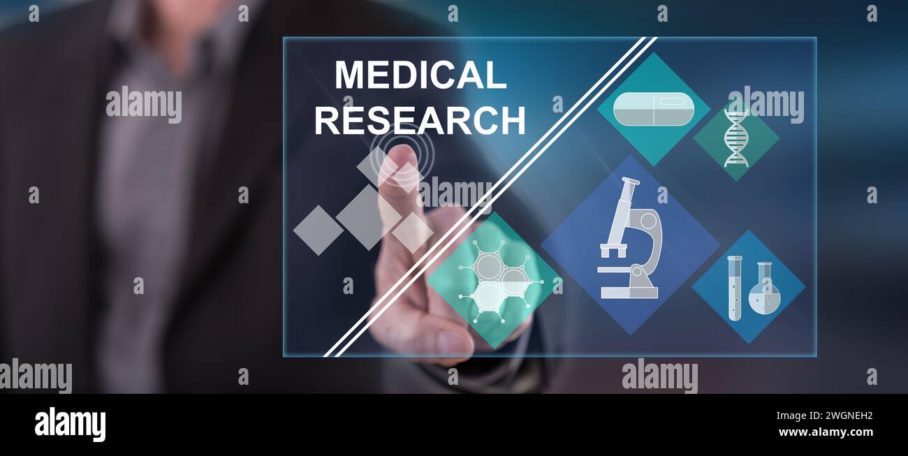 Man touching a medical research concept on a touch screen with his finger Stock Photo