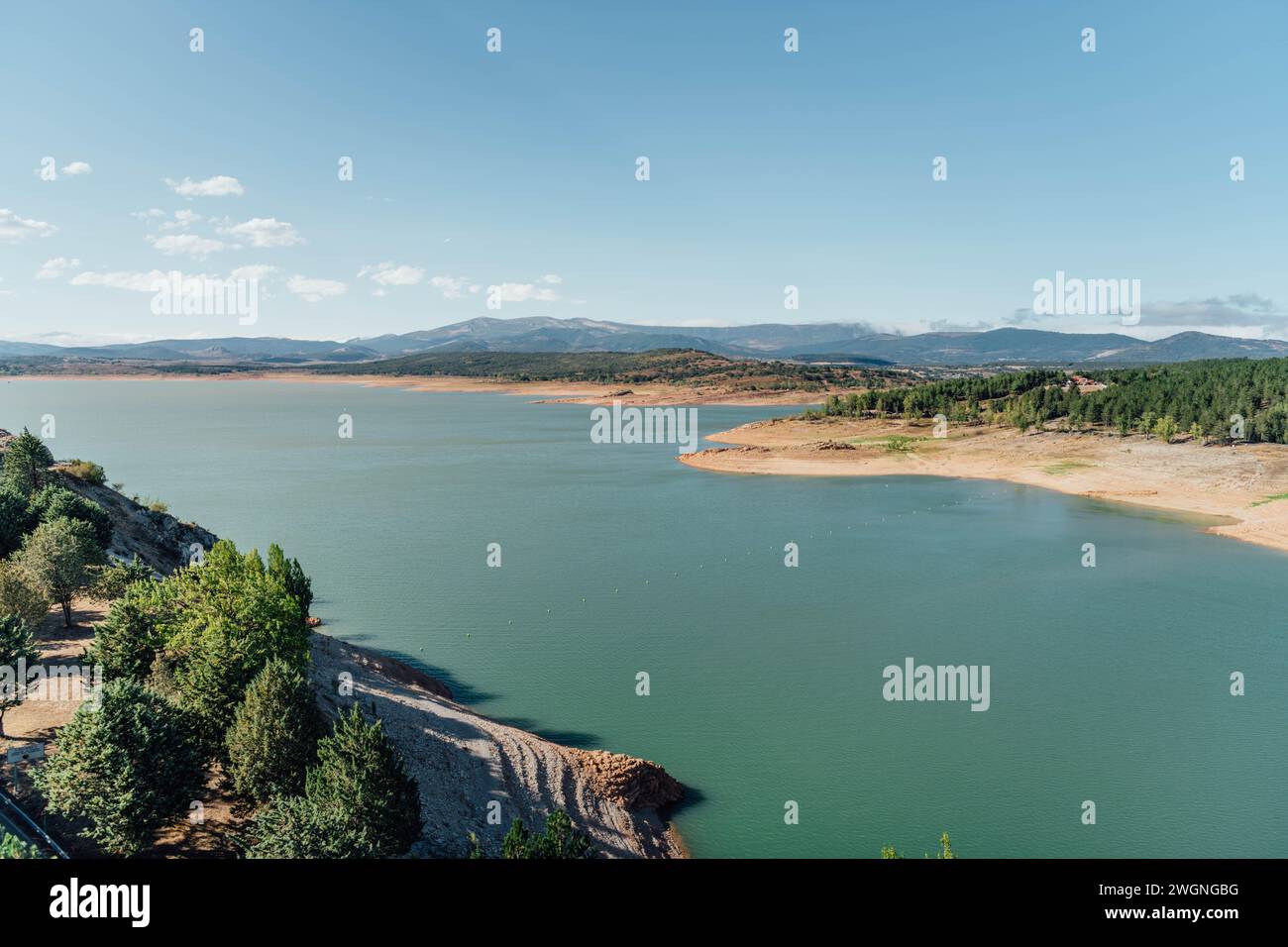Green water lake on a summer sunny day in Aguilar de Campoo, Spain Stock Photo