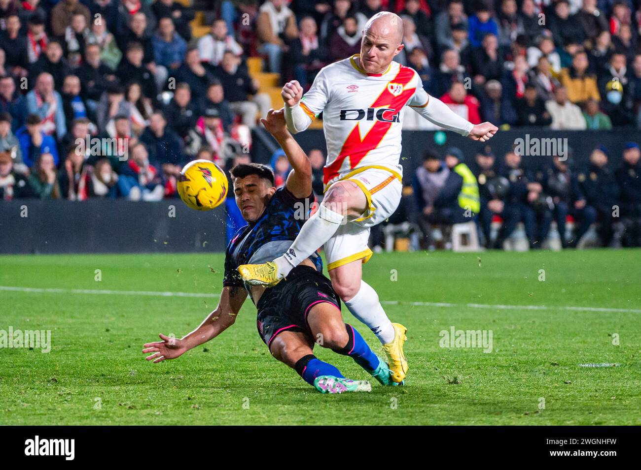 Madrid, Spain. 05th Feb, 2024. Isi Palazon (L) of Rayo Vallecano and Marcos Acuna (R) of Sevilla seen in action during the La Liga EA Sports 2023/24 football match between Rayo Vallecano vs Sevilla at Estadio Vallecas. Rayo Vallecano 1 : 2 Sevilla Credit: SOPA Images Limited/Alamy Live News Stock Photo