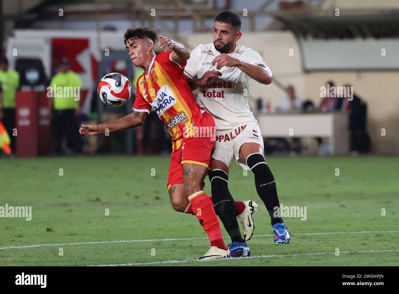 Diego Soto of Atletico Grau and Matias Di Benedetto of Universitario de Deportes during the Torneo Apertura Liga 1 Apuesta Total 2024 match between Universitario de Deportes and Atletico Grau played at Monumental Stadium on February 4, 2024 in Lima, Peru. (Photo by Miguel Marrufo / PRESSINPHOTO) Stock Photo