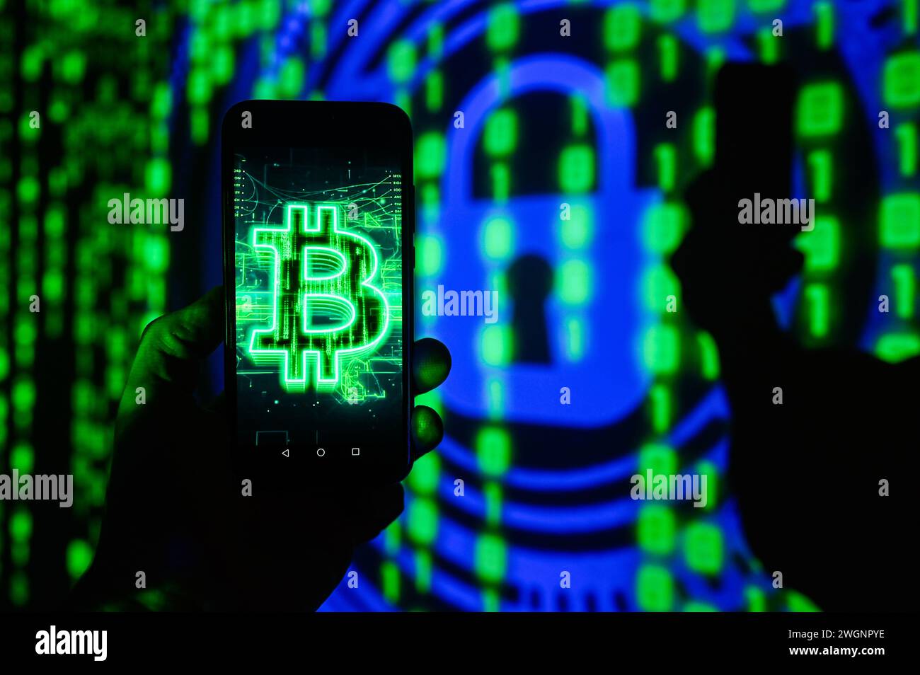 Poland 05th Feb 2024 In This Photo Illustration A Bitcoin Logo Is   Poland 05th Feb 2024 In This Photo Illustration A Bitcoin Logo Is Displayed On A Smartphone With Coding Lines On The Background Credit Sopa Images Limitedalamy Live News 2WGNPYE 