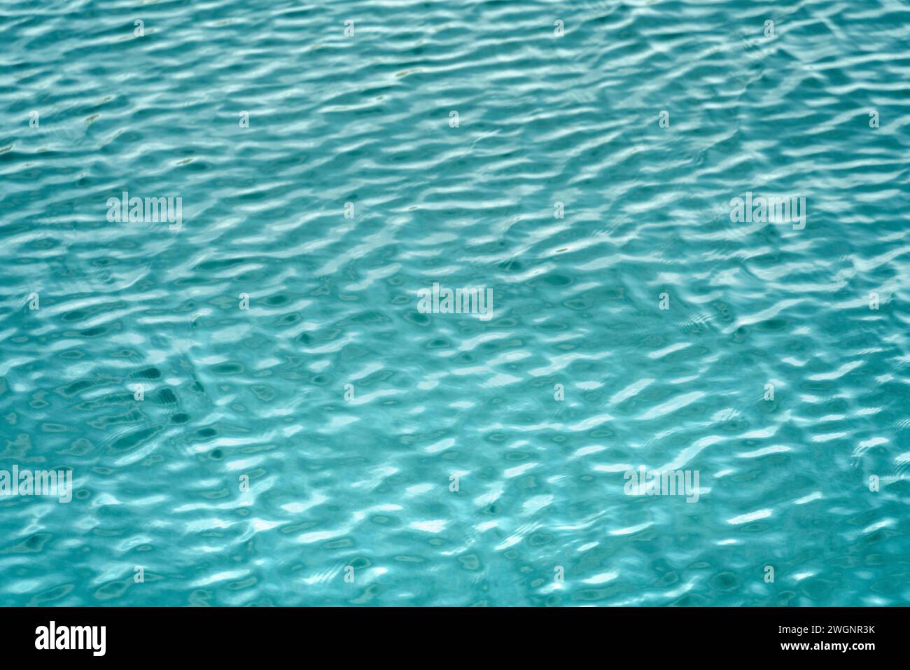 Full frame abstract light blue ripply water surface Stock Photo