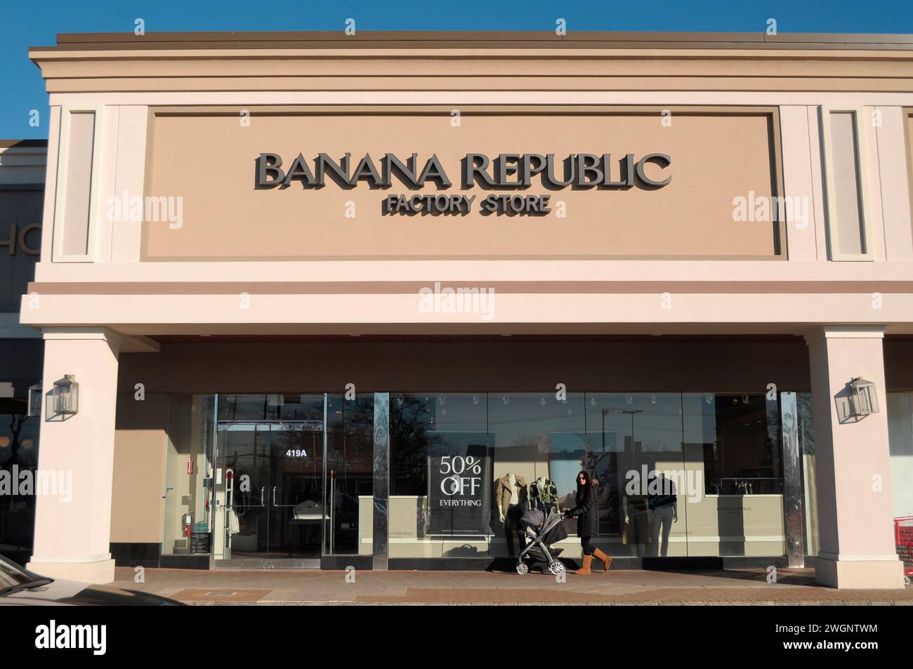 New York, United States. 05th Feb, 2024. A person walks past a Banana Republic Factory store in the neighborhood of Plainview in Nassau County, Long Island, New York. Credit: SOPA Images Limited/Alamy Live News Stock Photo