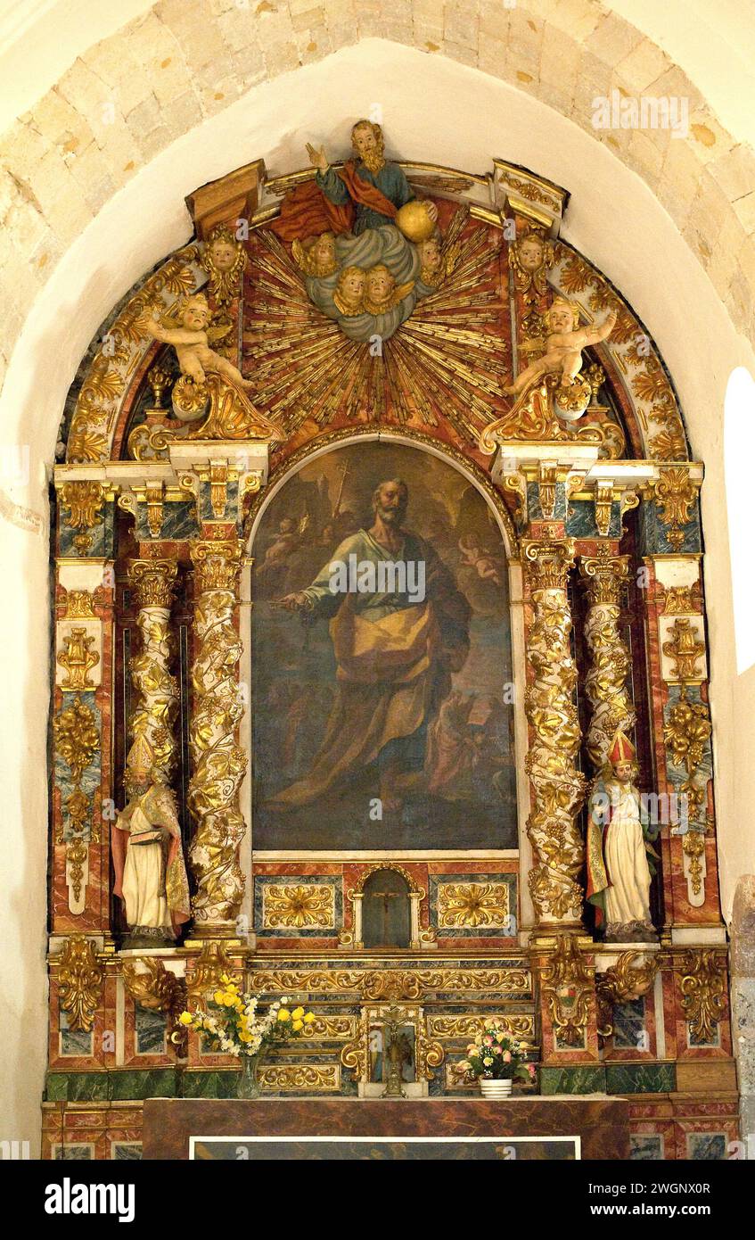 Caracena, San Pedro church (romanesque 12th century). Baroque altarpiece. Soria province, Castilla y Leon, Spain. Stock Photo