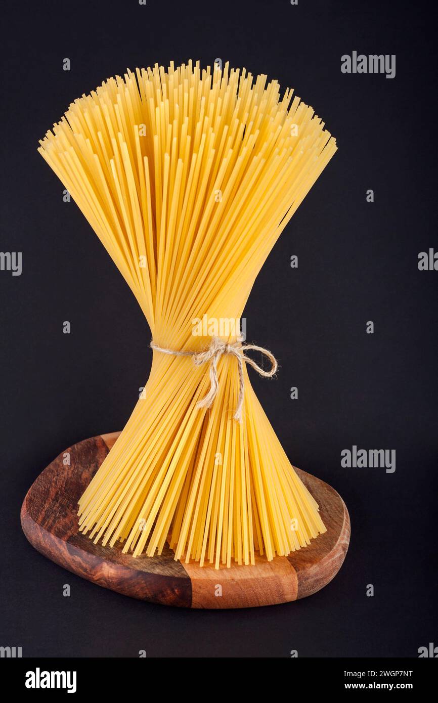 Bunch of spaghetti on black background Stock Photo
