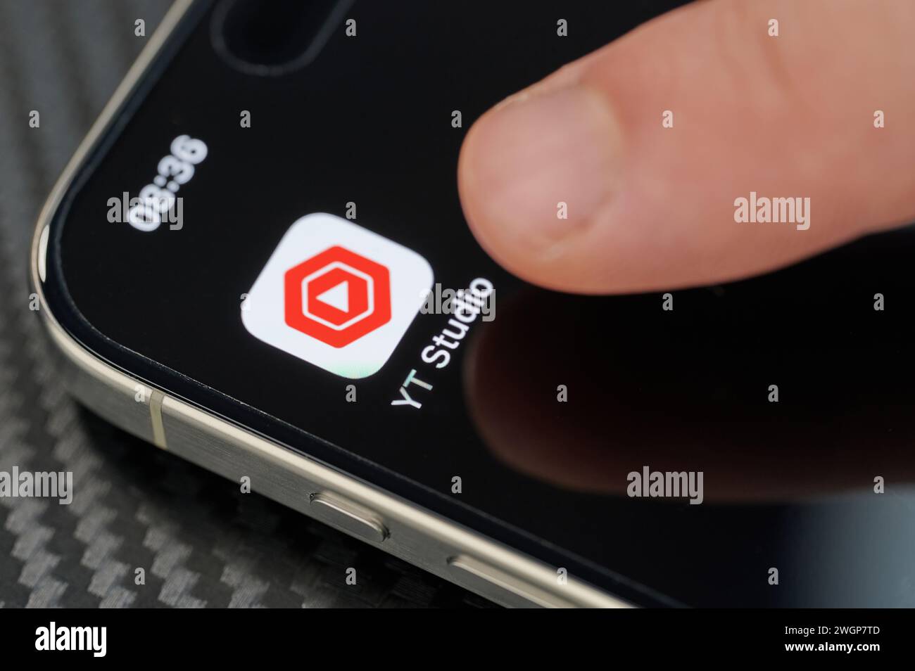 New York, USA - January 24, 2024: Touching top open Youtube Studio app ...