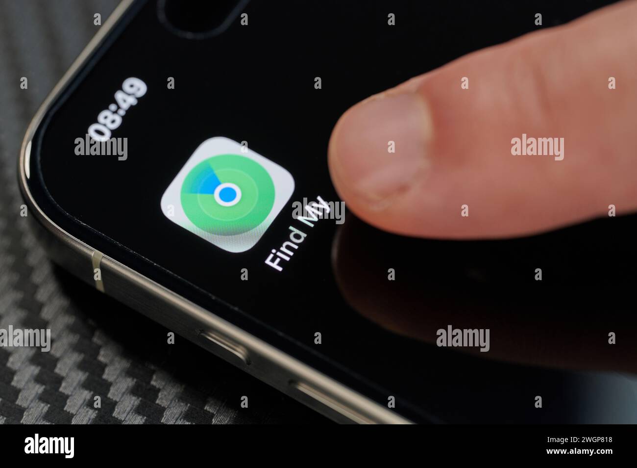 New york usa january 24 2024 touching top open find my app icon