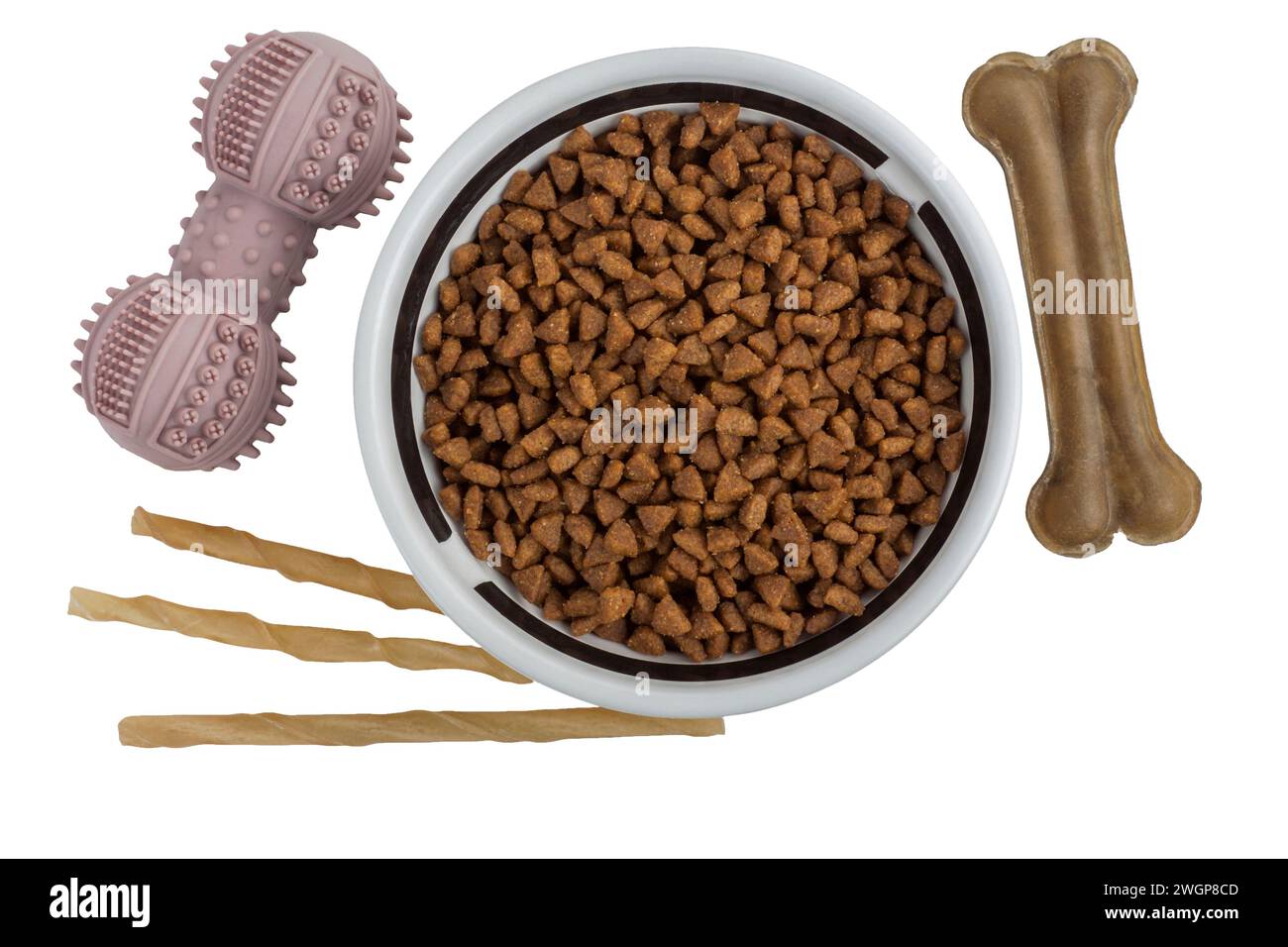 Dog food and toys isolated on white background Stock Photo