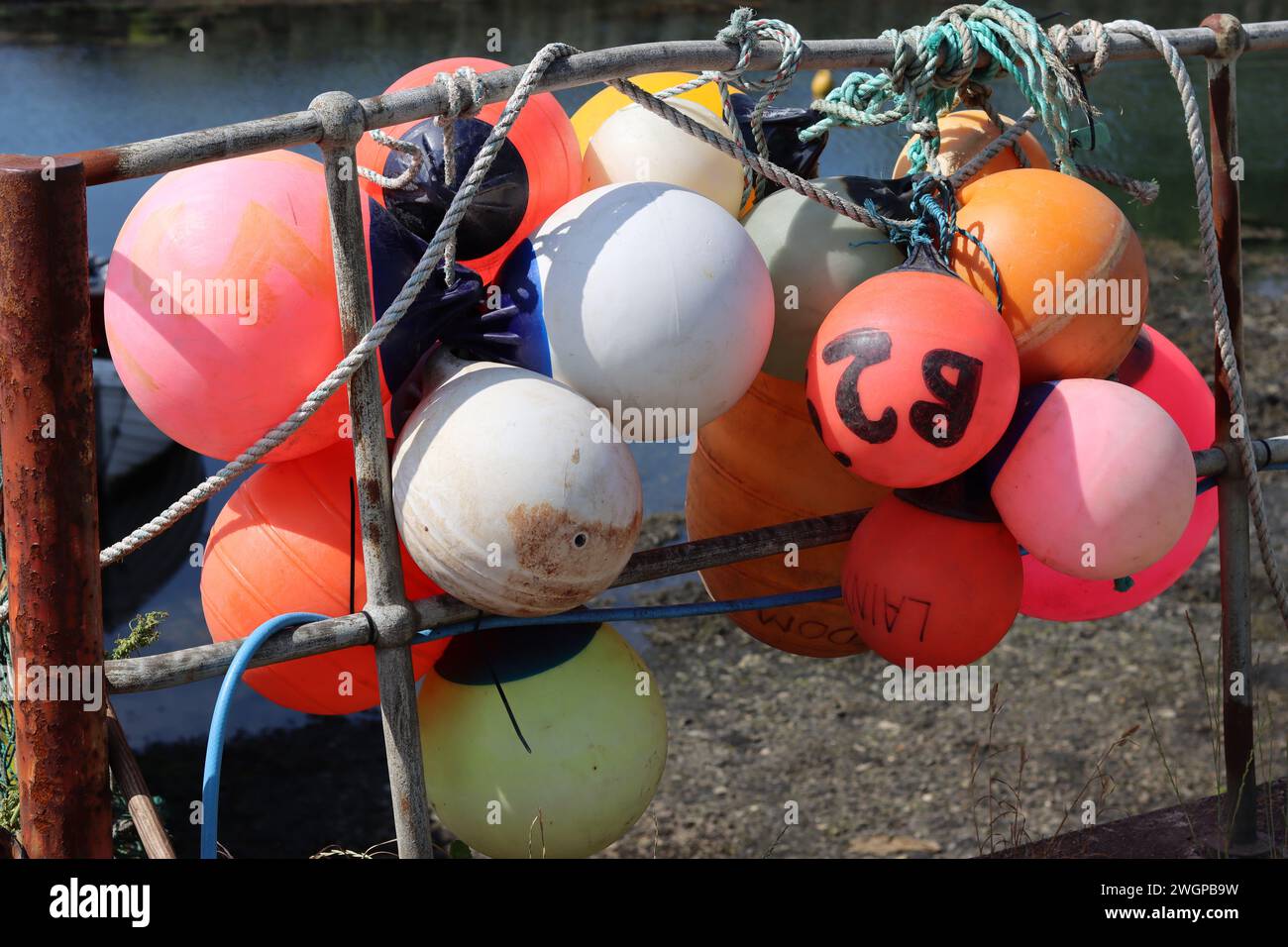 Group of colourful fishing buoys in a harbour Stock Photo Alamy