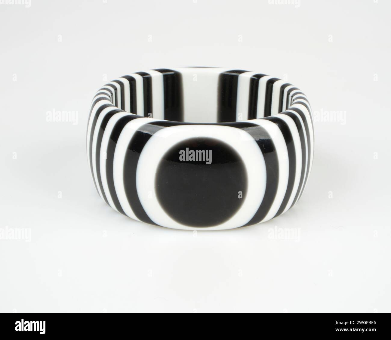 Vintage 1960s black and white op art lucite bangle hires stock