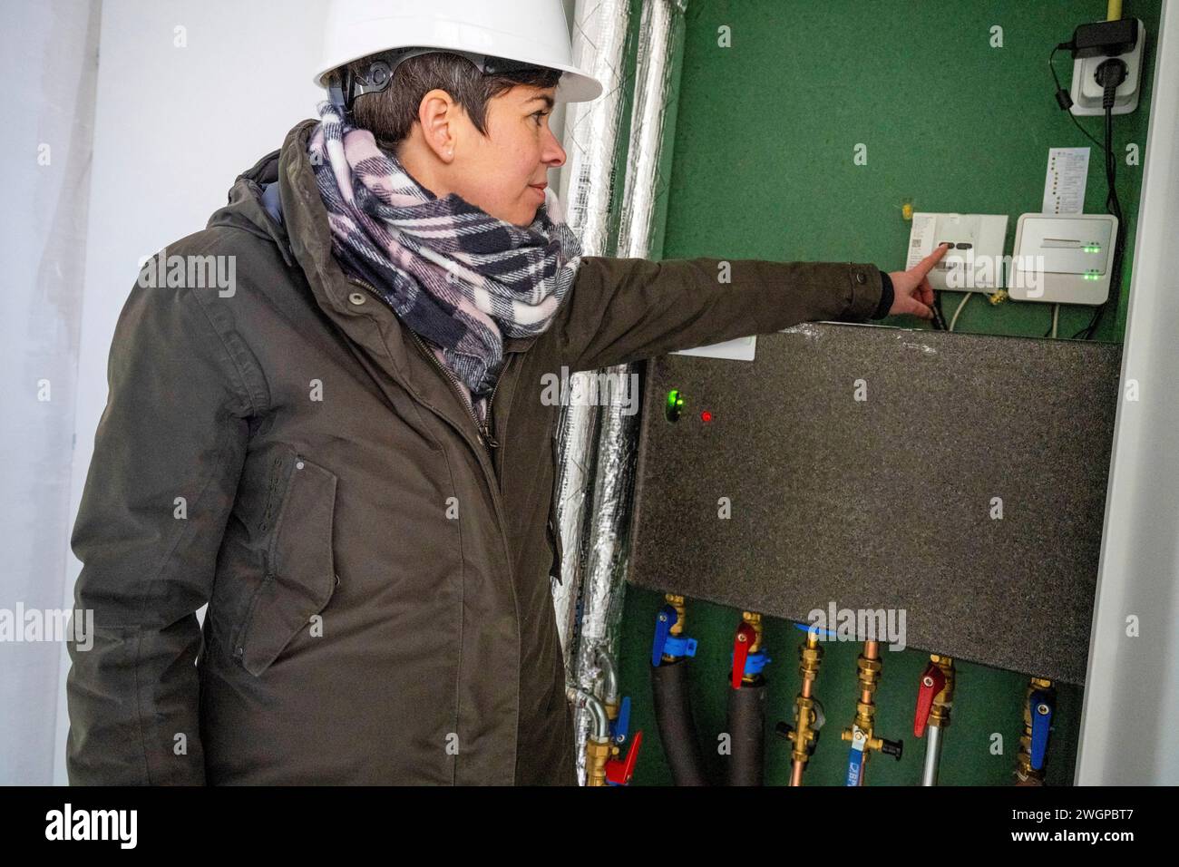Female Construction manager walking around site Stock Photo