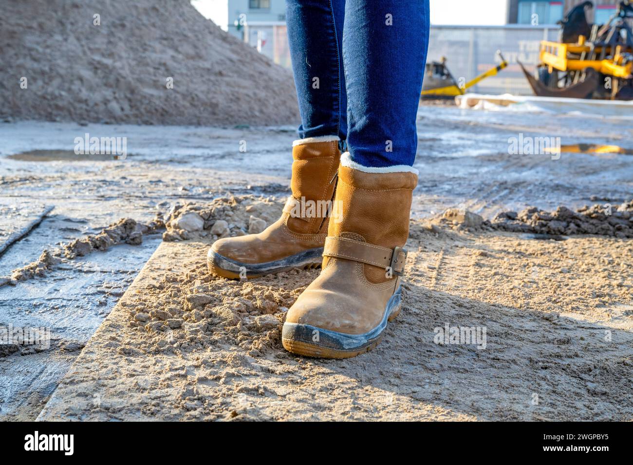Female Construction manager walking around site Stock Photo