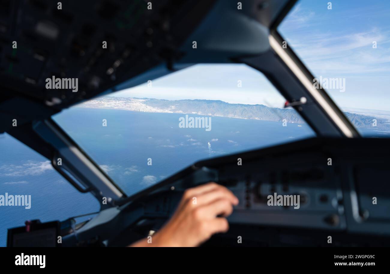 Cockpit view of an aircraft turning in flight Stock Photo