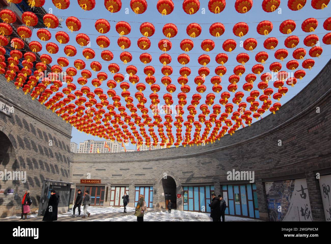 Qingdao, China's Shandong Province. 6th Feb, 2024. People visit the Jimo ancient town in Qingdao, east China's Shandong Province, Feb. 6, 2024. Credit: Zhang Tao/Xinhua/Alamy Live News Stock Photo