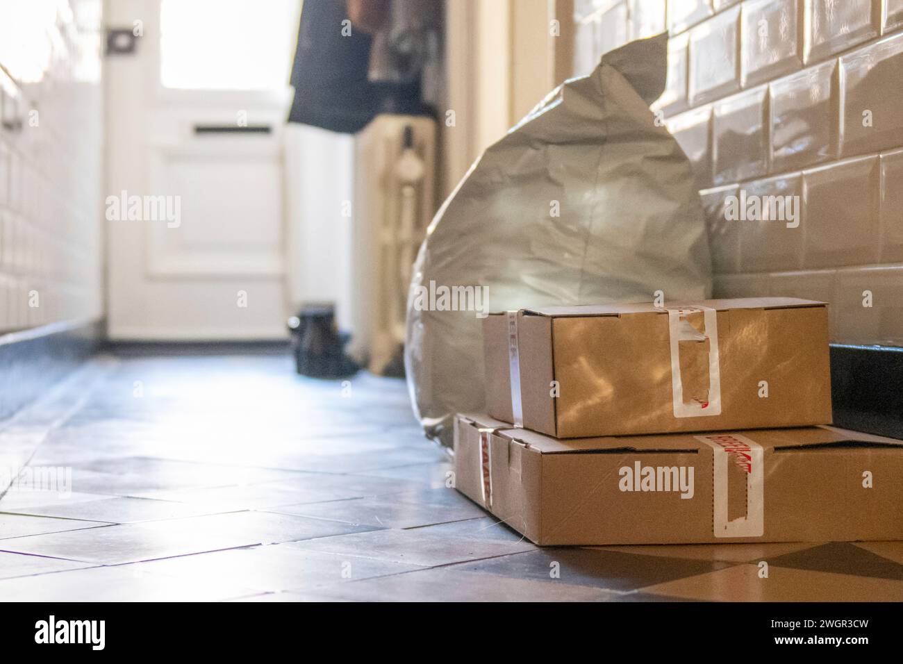 Packages in the hallway waiting to be returned Stock Photo