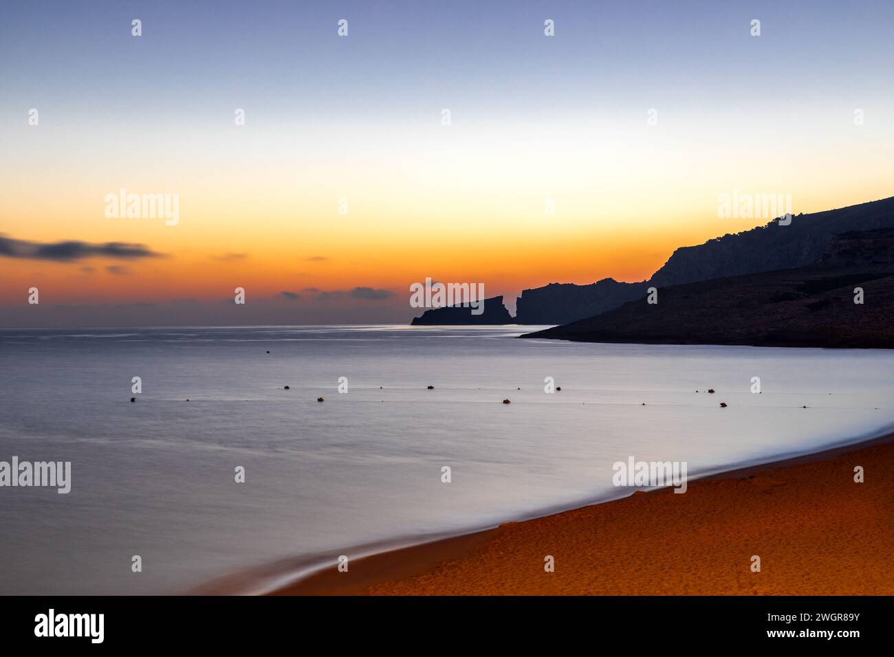 Dawn in the bay of Cala Mesquida, Island of Mallorca, Spain Stock Photo