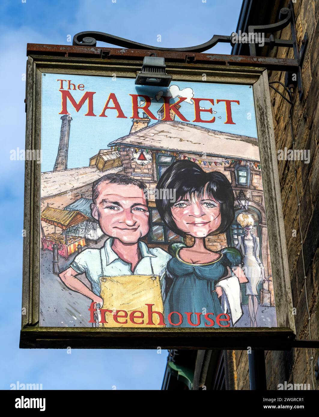Traditional hanging pub sign at The Market Hotel public house, Wentworth Road, Elsecar, Barnsley, South Yorkshire, England, UK Stock Photo