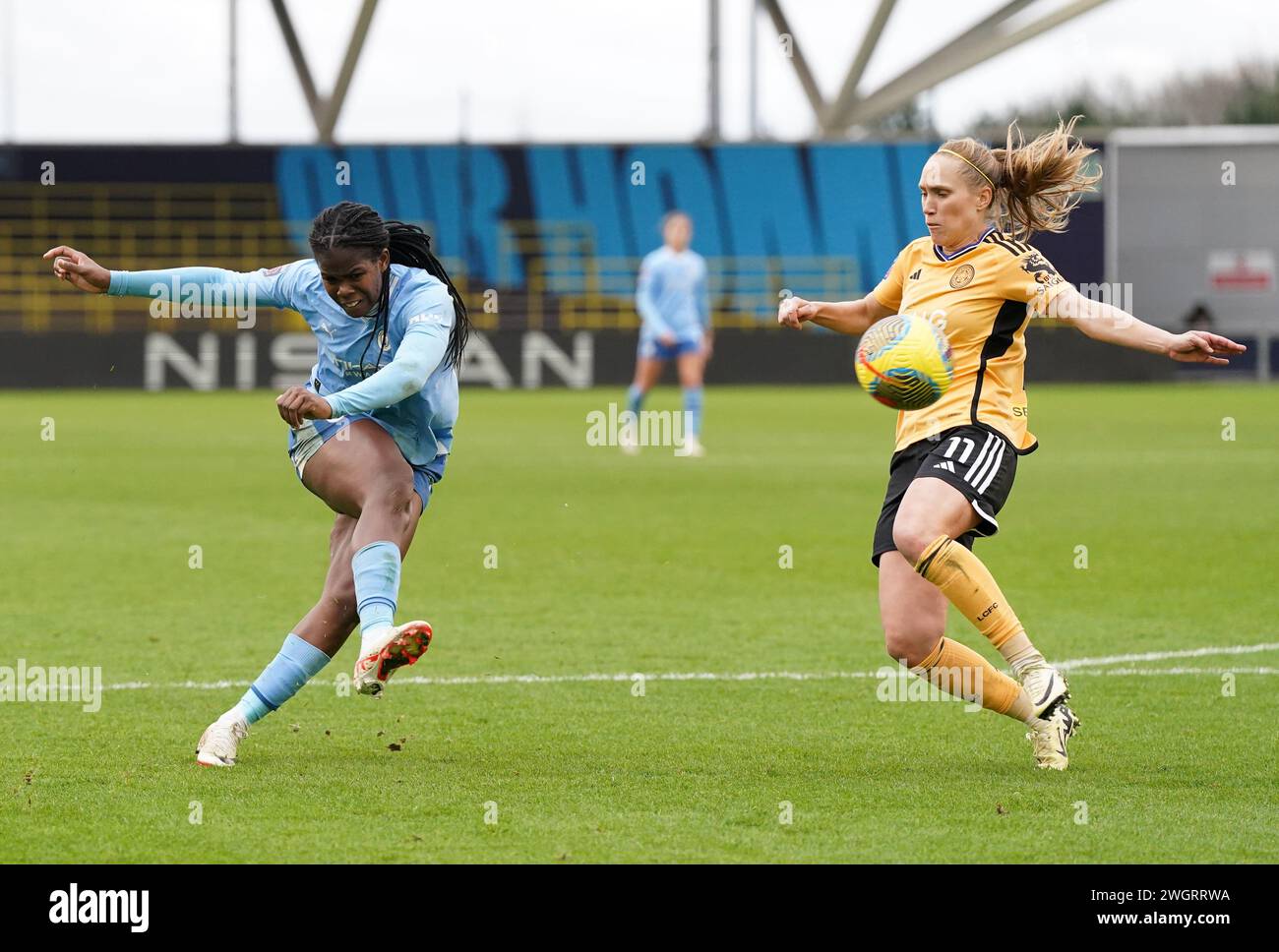 Manchester City's Khadija Shaw (left) Attempts A Shot On Goal Past ...