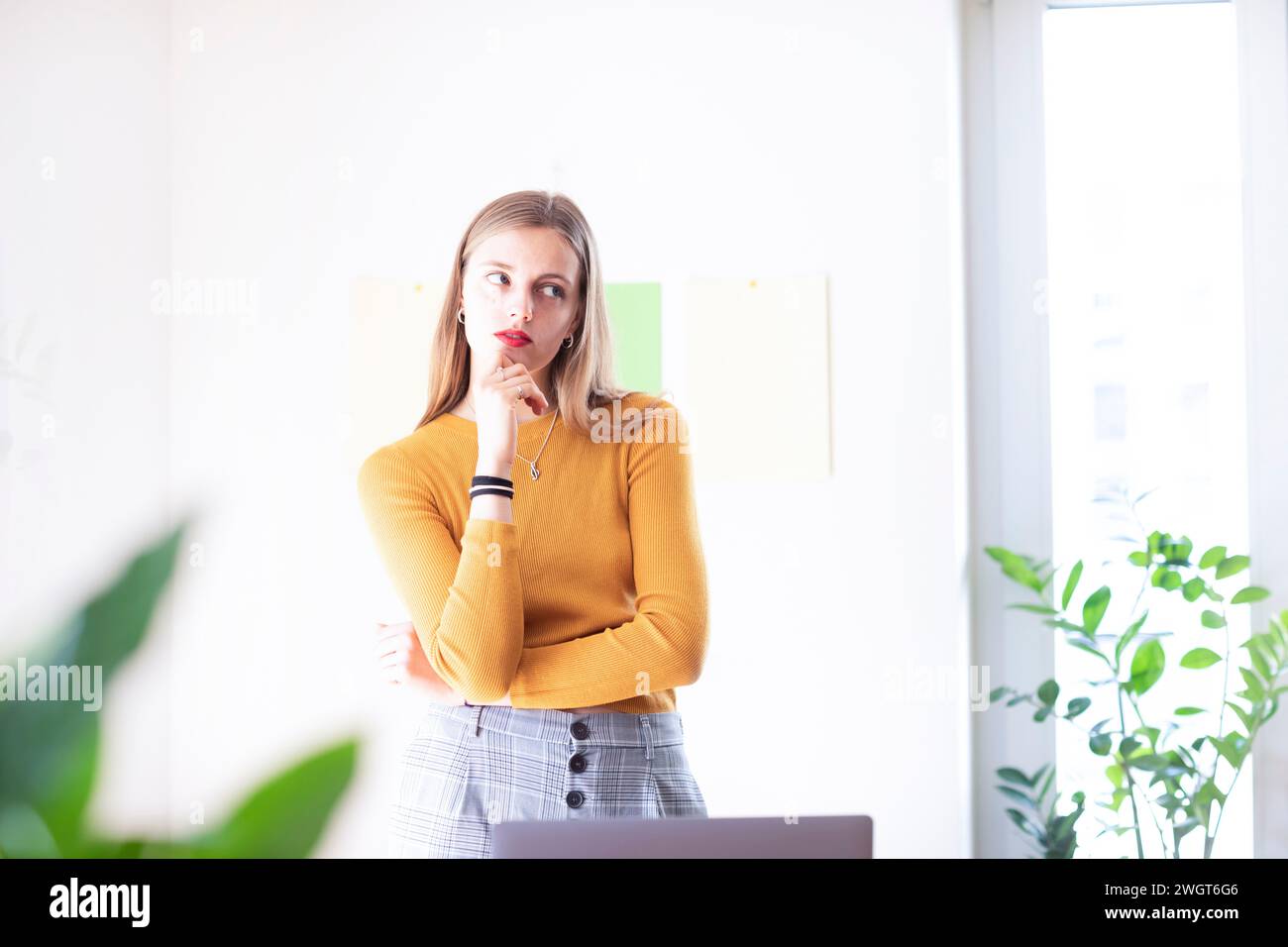 Smiling young woman in casual hi-res stock photography and images - Alamy