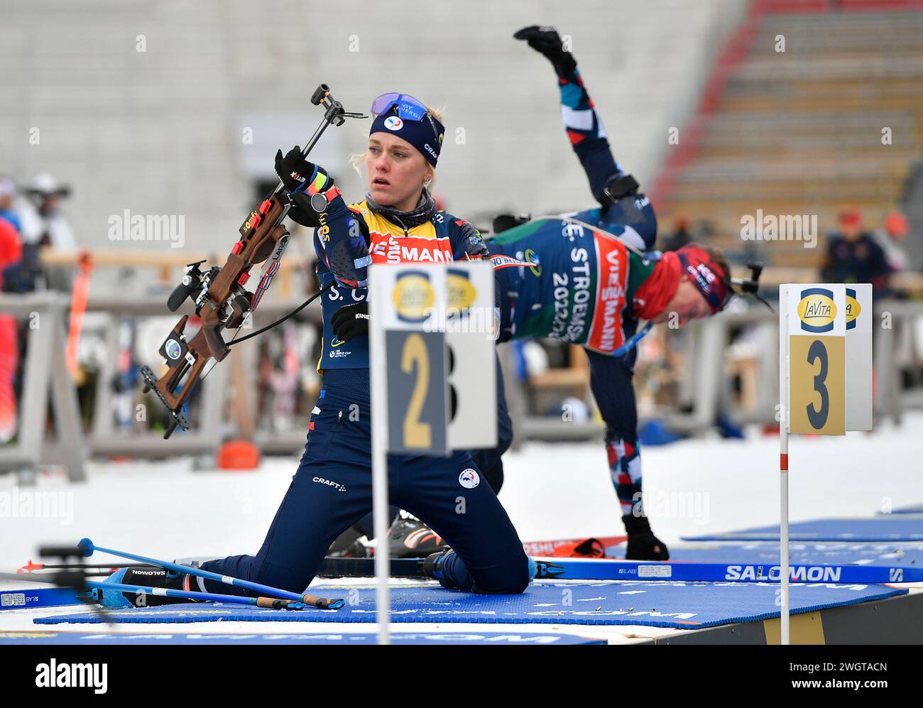 Chloe Chevalier of France, left, and Endre Stroemsheim of Norway during  official training for the Biathlon