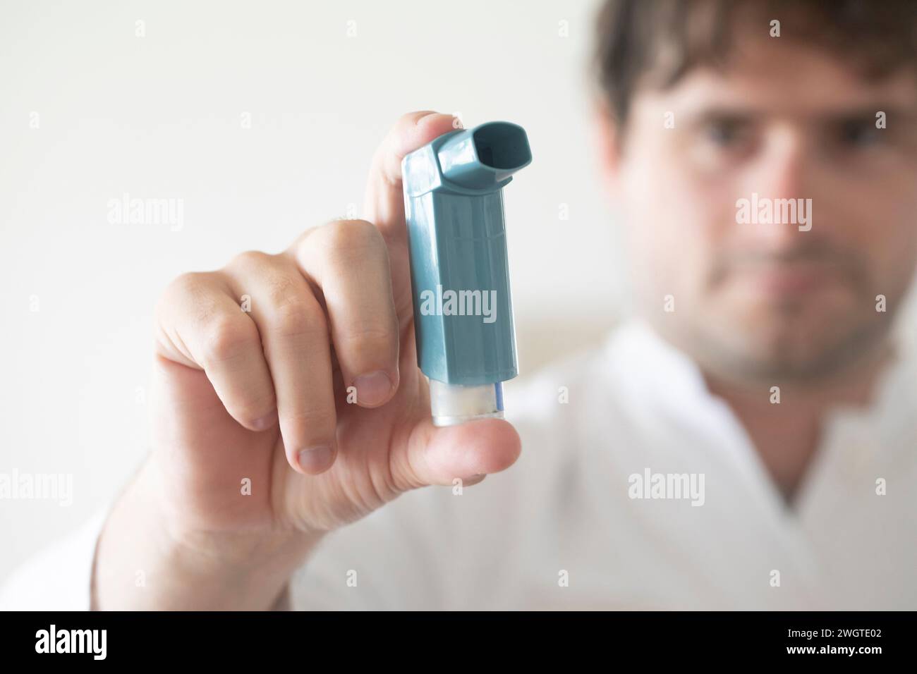 doctor male holding  an asthma spray in hishand Stock Photo