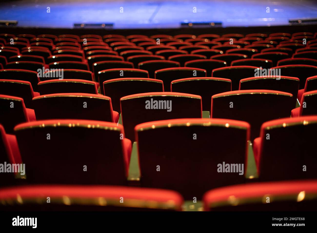 back view of empty red velvet seats in movie theater Stock Photo - Alamy