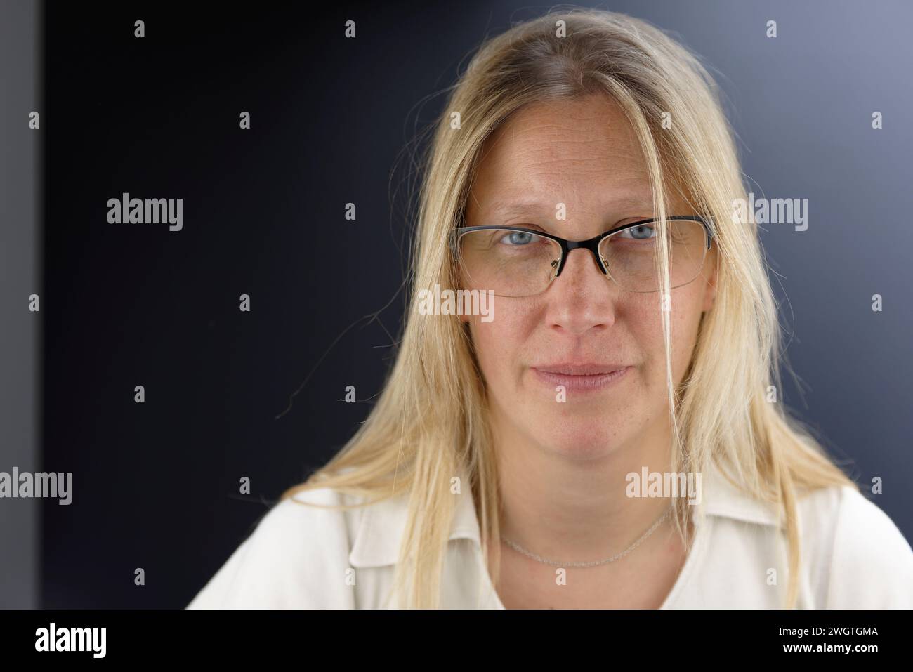 Blonde woman indoors, Milano, Italy. Stock Photo