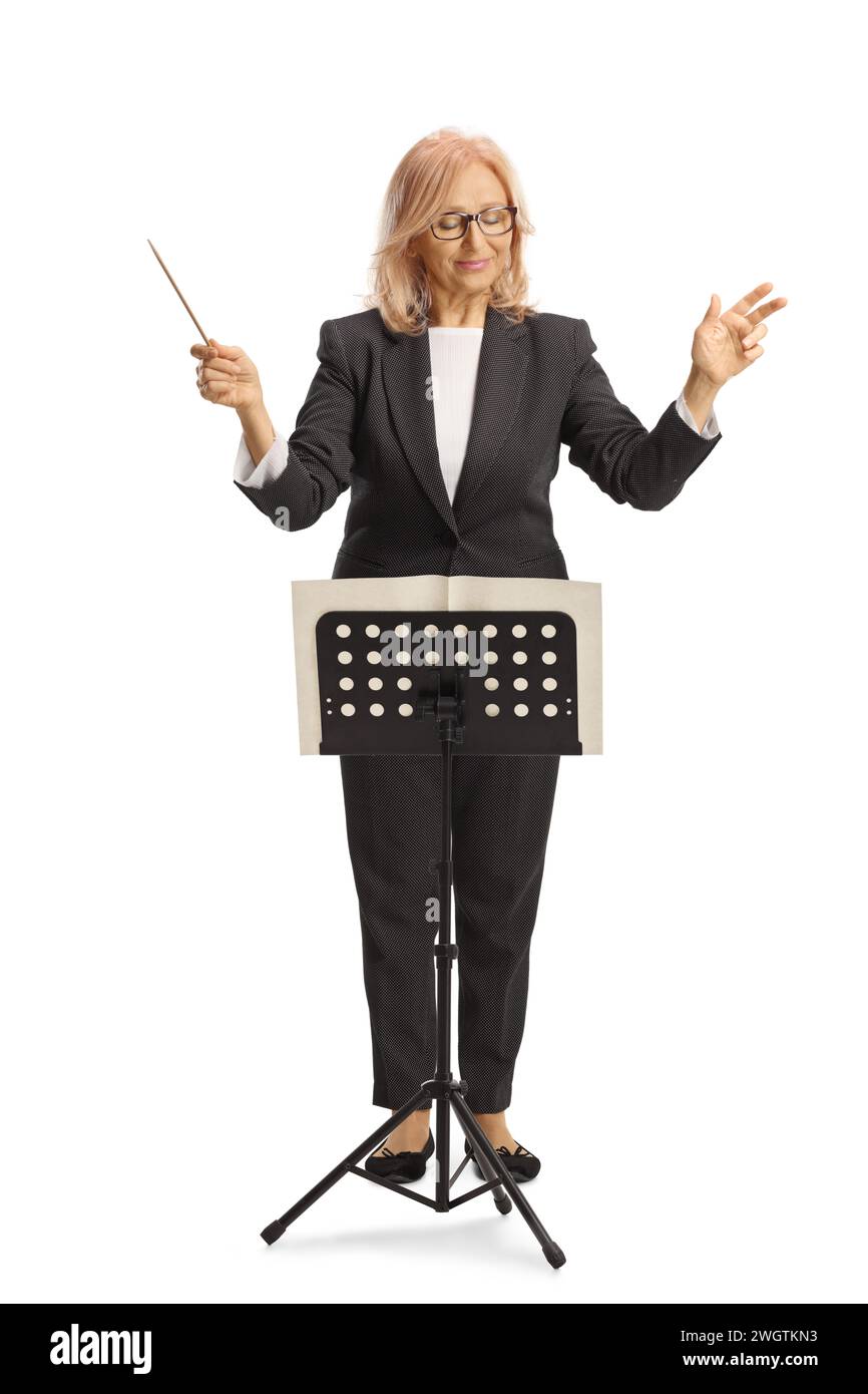 Female conductor performing with a music note stand isolated on white background Stock Photo