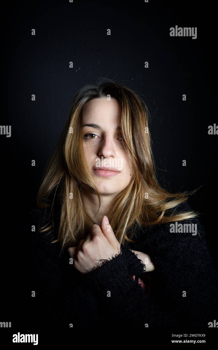 Young woman indoors, Milano, Italy. Stock Photo