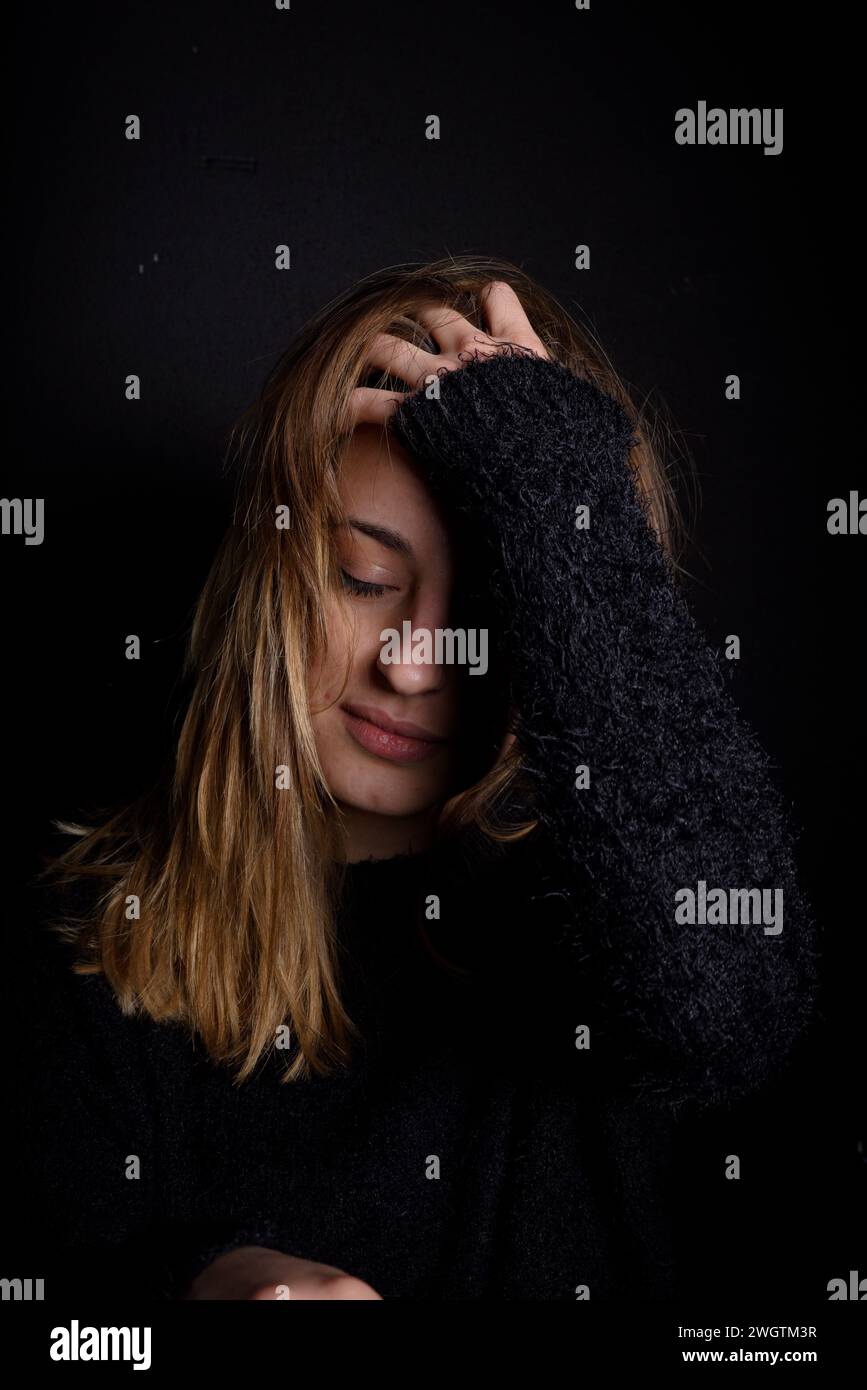 Young woman indoors, Milano, Italy. Stock Photo