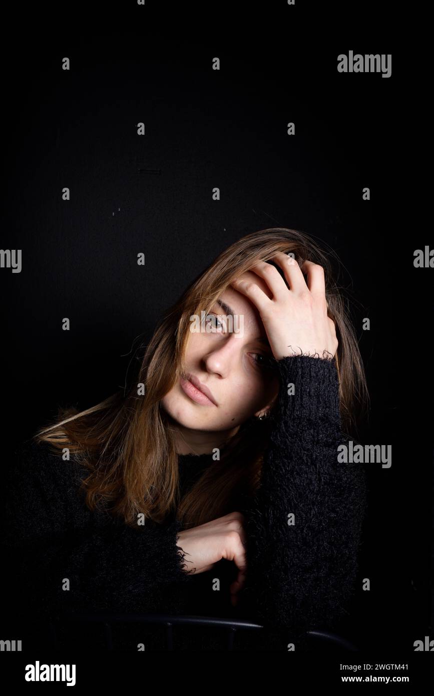 Young woman indoors, Milano, Italy. Stock Photo