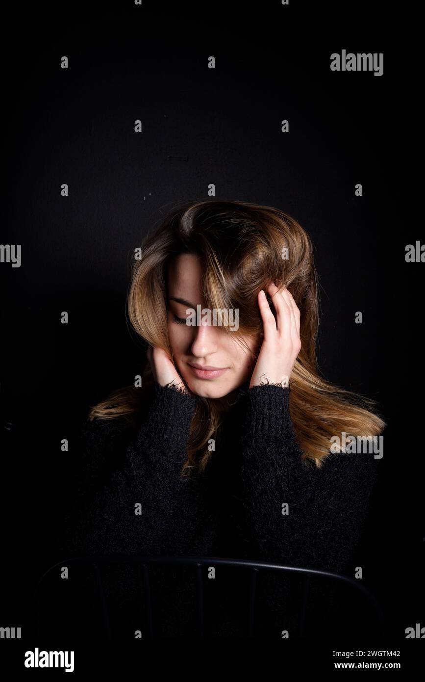 Young woman indoors, Milano, Italy. Stock Photo