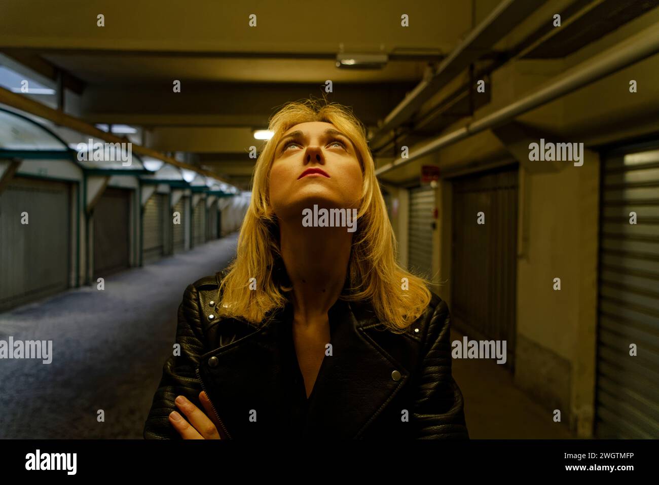 Young blond woman indoors., Milano, Italy. Stock Photo