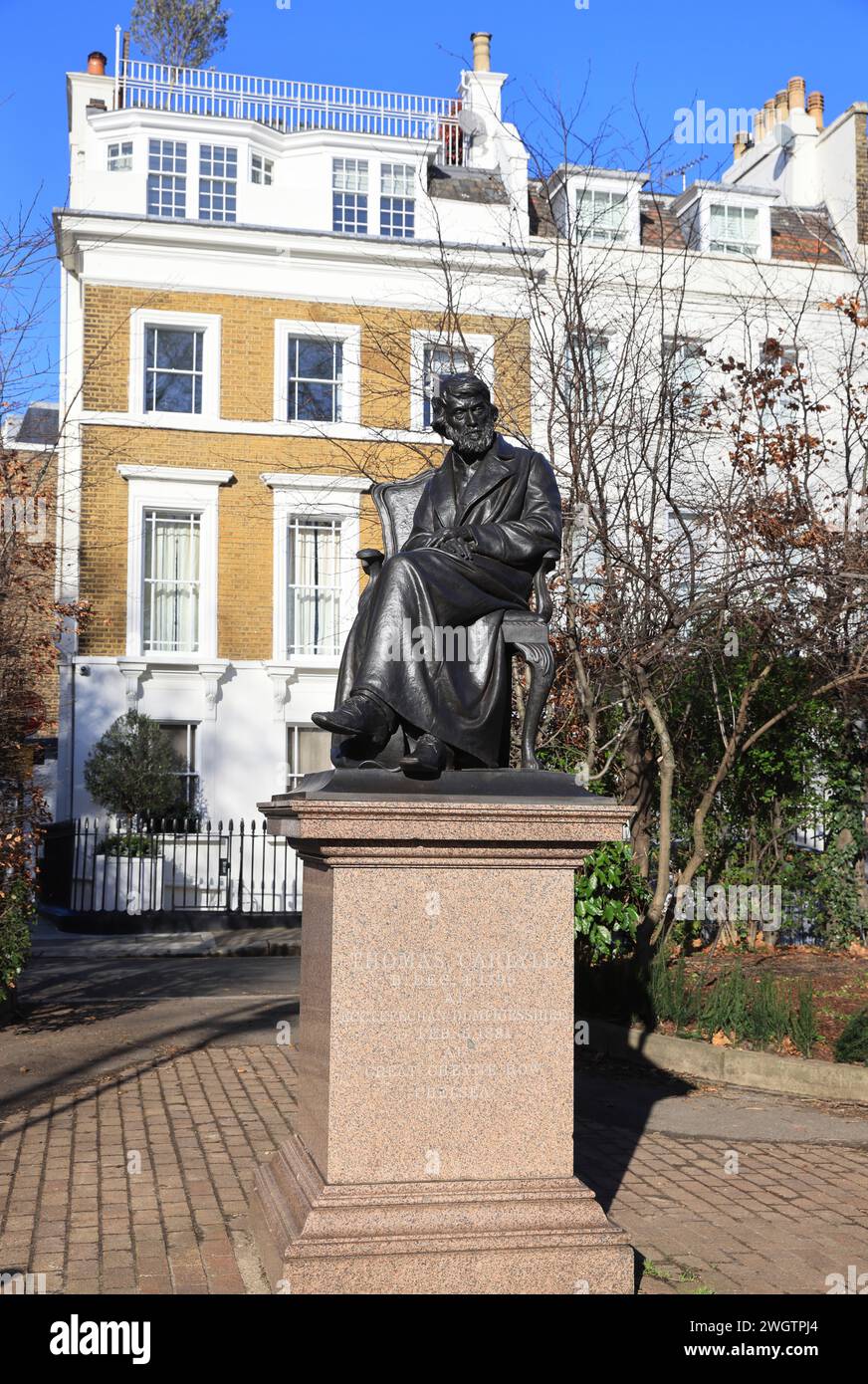 Statue of Thomas Carlyle, near his house on Cheyne Row, in Chelsea, a Scottish writer, influencing 19th Century art, literature & philosophy, London. Stock Photo