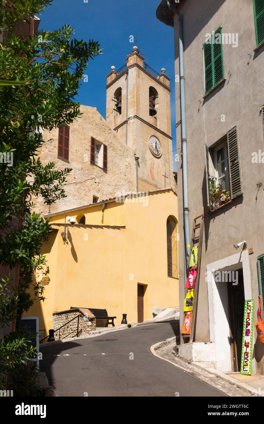 Looking up steep street / road scene at Saint Peters Church in Cagnes-sur-Mer, French Riviera town near Nice which has a historic popularity with artists and painters. France. (135) Stock Photo