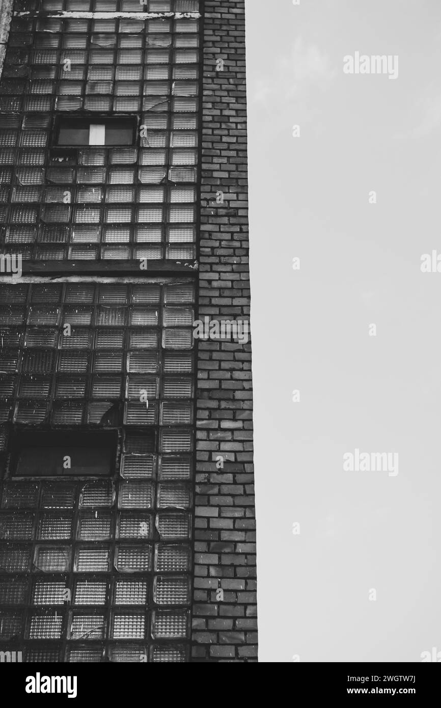 Black an white brick block building Stock Photo Alamy