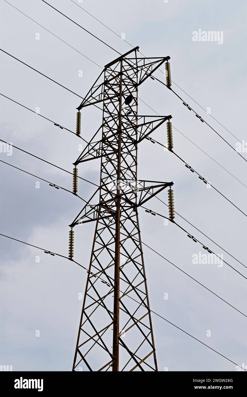 Metal tower with high voltage wires Stock Photo - Alamy