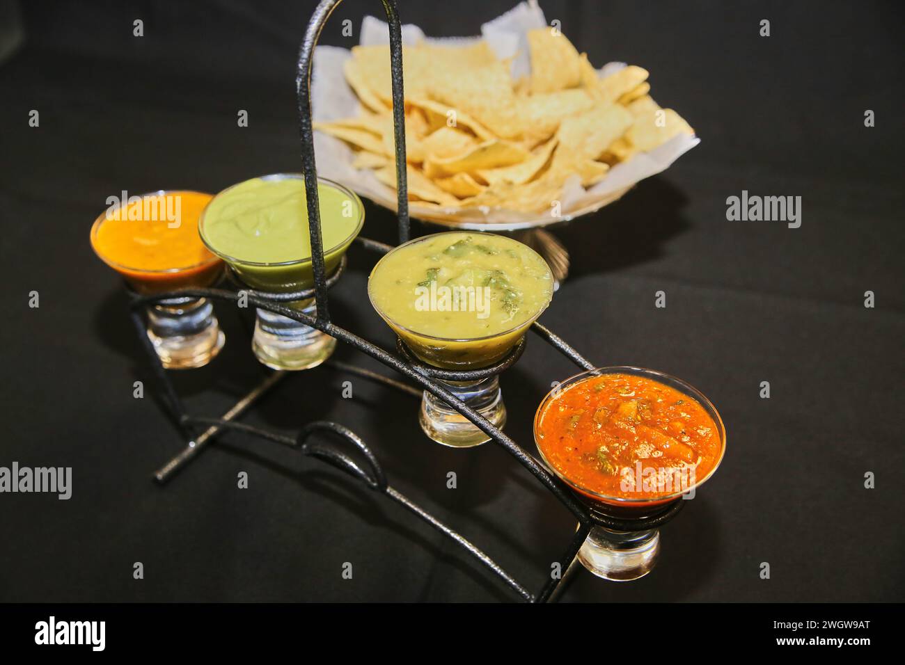 Mexican Cuisine Appetizer Platter with Tortilla Chips and Dips Stock Photo